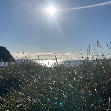 Wellness Ferienhaus Meerjungfrau inklusive Infrarotsauna und Strandkorb am Strand Scharbeutz