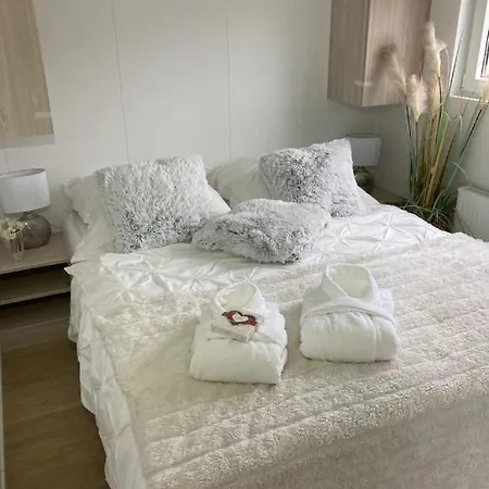 Ferienhaus Wellness Ferienhaus Meerjungfrau inklusive Infrarotsauna und Strandkorb am Strand Scharbeutz